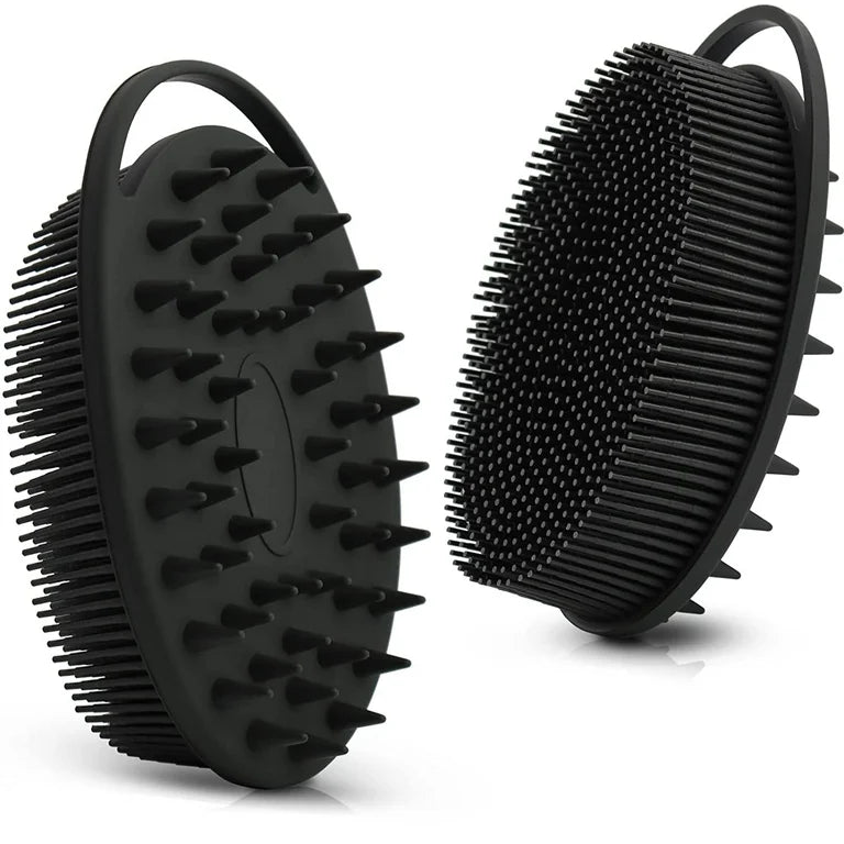 Two black silicone scrubbing brushes with textured surfaces on a white background