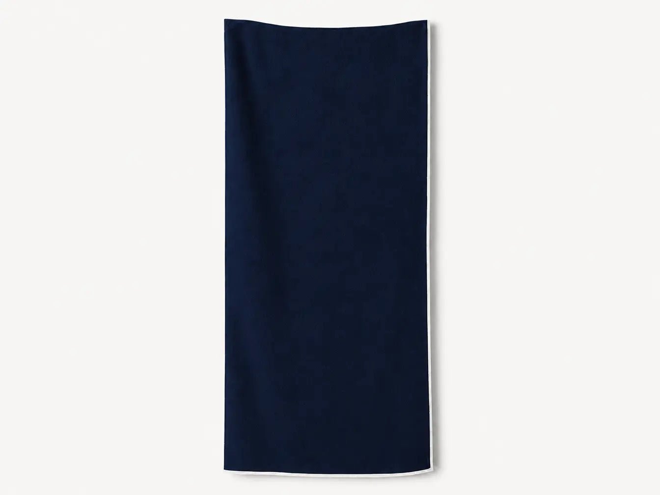 Navy blue towel on a white background