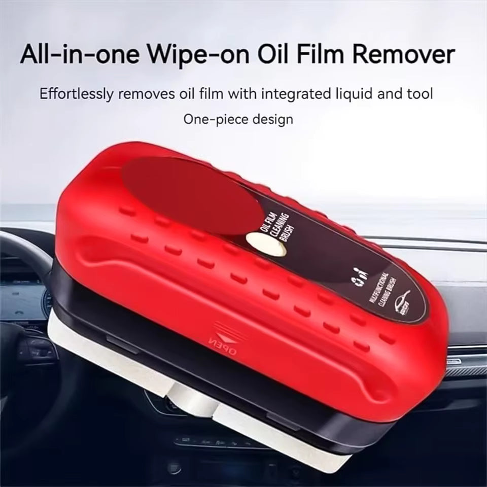 Red and black all-in-one wipe-on oil film remover on a car dashboard.